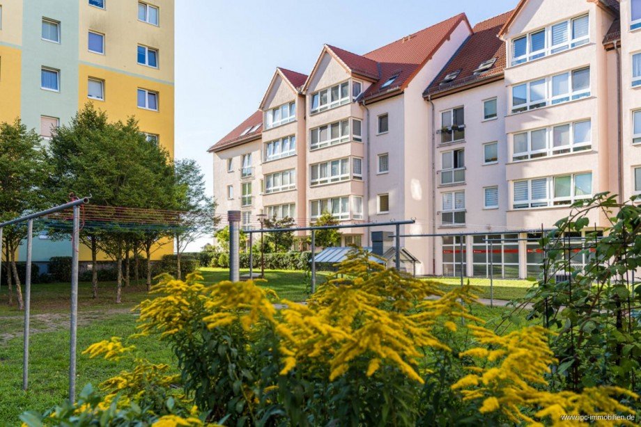 Hausansicht Gartenseite Dachgeschosswohnung Waren